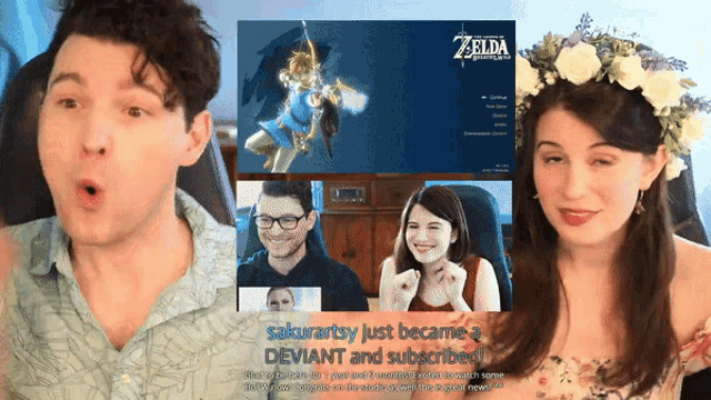 a man and a woman are sitting in front of a screen that says zelda on it