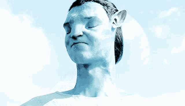 a close up of a man 's face with a blue background
