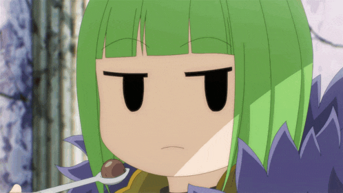 a girl with green hair is holding a spoon in her mouth