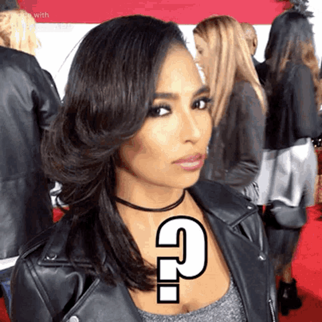 a woman with a choker and a question mark on her neck