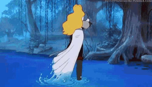 a princess and a prince are dancing in the water in a swamp .