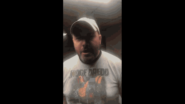 a man wearing a shirt that says jorge doblado