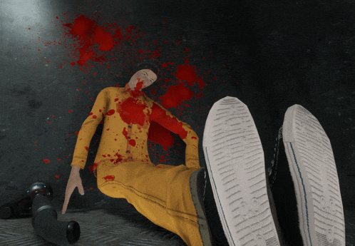 a man in a yellow suit is laying on the floor with blood coming out of his head and feet