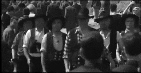 a black and white photo of a group of people