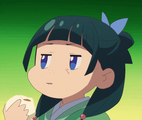 a girl with a blue bow in her hair holds a white object