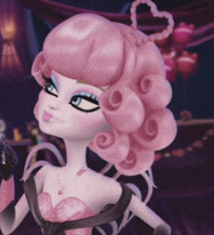 a doll with pink hair and a heart shaped necklace