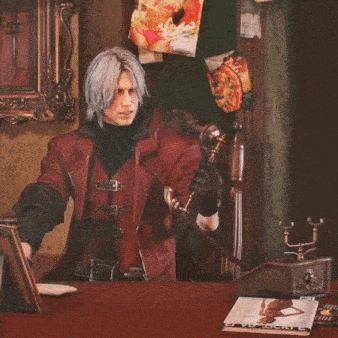 a man in a red leather jacket is talking on a phone