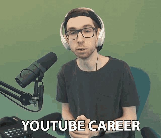 a man wearing headphones stands in front of a microphone with the words youtube career below him