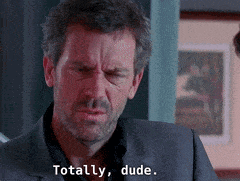 a man in a suit says totally dude