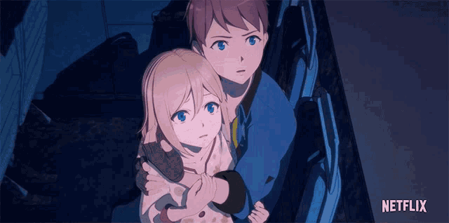 a boy and a girl are hugging in a netflix advertisement