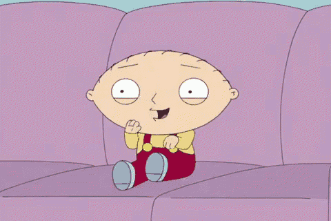 a cartoon character is sitting on a couch