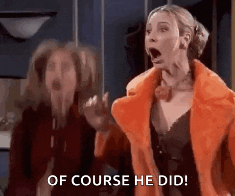 a woman in a fur coat is screaming with her mouth open while another woman looks on .