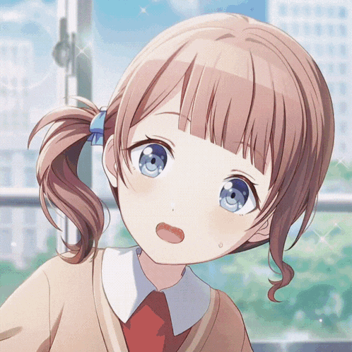 a little girl with pigtails and blue eyes