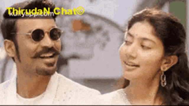 a man with a mustache and sunglasses looks at a woman