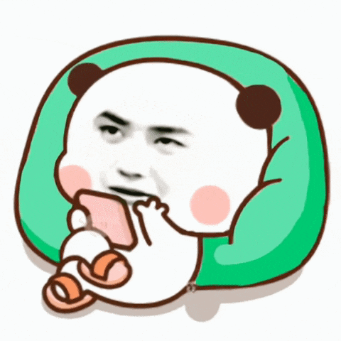 a cartoon panda is laying on a green pillow and holding a cell phone .