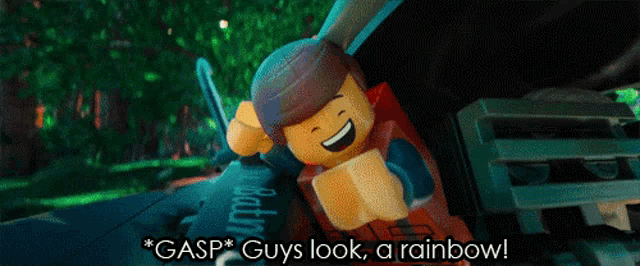 a lego character is smiling and says gasp guys look a rainbow