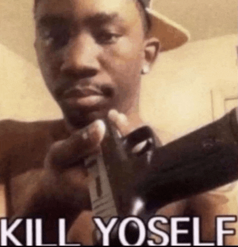 a man is holding a gun with the words `` kill yoself '' written on the bottom .