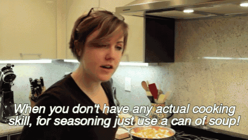 a woman in a kitchen says " when you don t have any actual cooking skill for seasoning just use a can of soup "