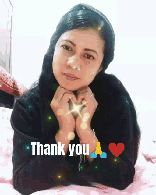 a woman laying on a bed with a heart and the words thank you above her