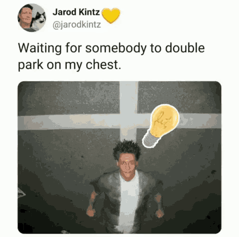 a tweet by jarod kintz shows a man standing on a street with a light bulb above his head