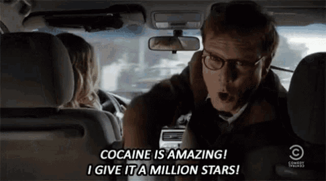 a man in a car says cocaine is amazing and give it a million stars