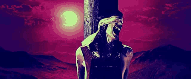 a man with his eyes closed is tied to a cross
