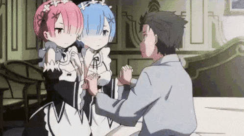 a man is sitting at a table holding the hands of two anime girls .