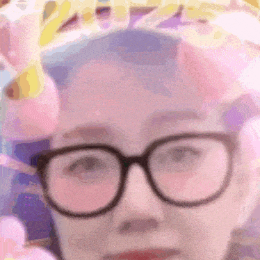 a blurry picture of a person wearing glasses with the year 2022 written in the background