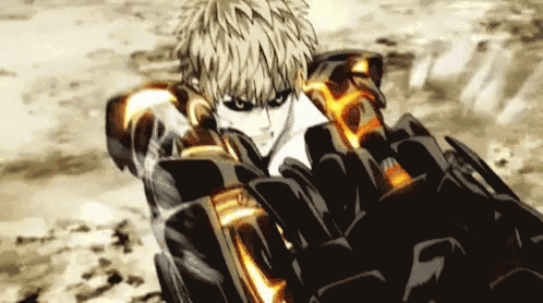 a man is holding a giant robot arm in his hands .