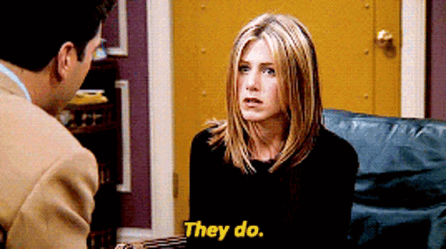 a woman sitting in a chair talking to a man with the words " they do " on the bottom