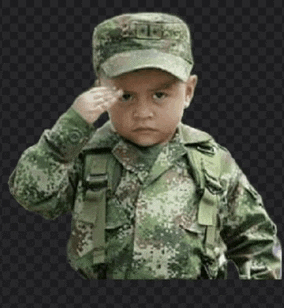 a little boy in a military uniform salutes with his hand on his forehead .