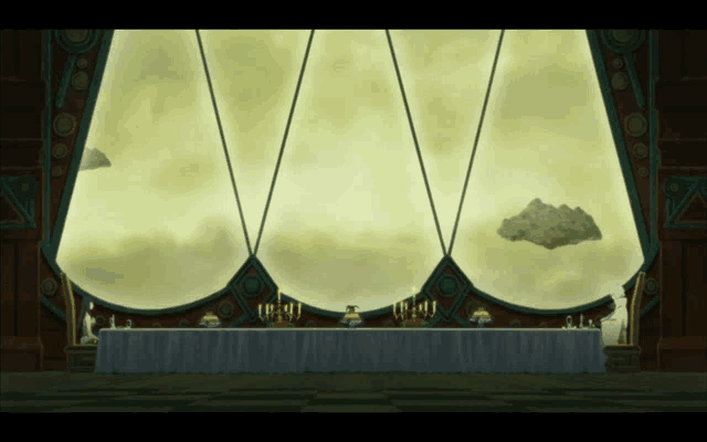 a long table in front of a large window with a cloud floating in the sky