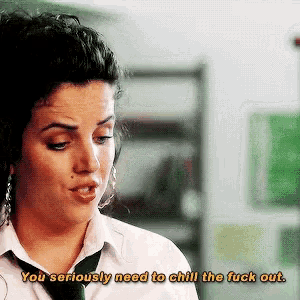 a woman in a tie says you seriously need to chill the fuck out