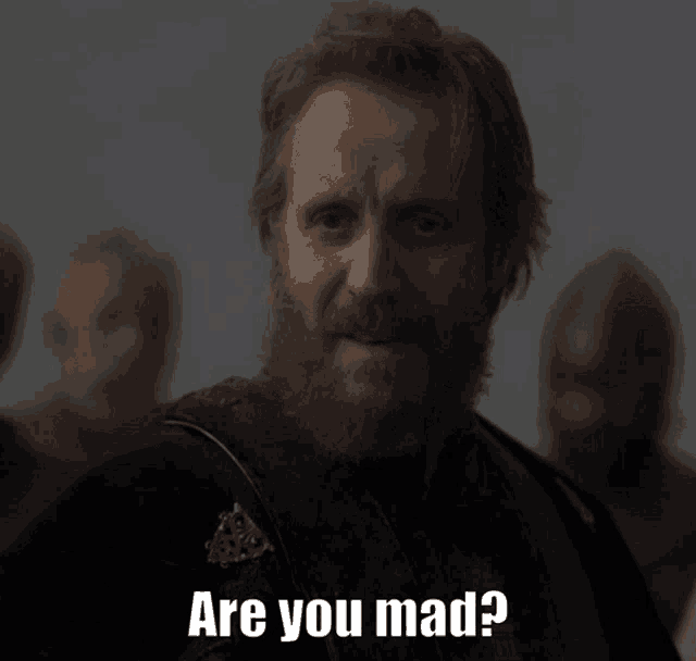 a man with a beard is asking if he is mad