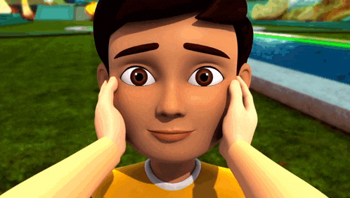 a boy in a yellow shirt holds his head with his hands