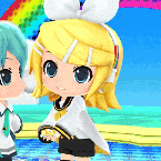 a boy and a girl are standing next to each other on a beach