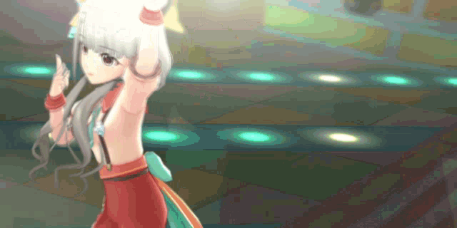 a girl in a red and green dress is dancing
