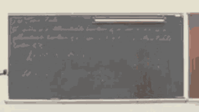 a man stands in front of a blackboard that says ' to your task ' on it