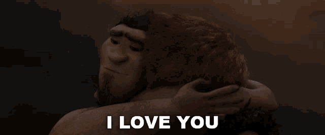 a man hugging another man with the words " i love you " above them