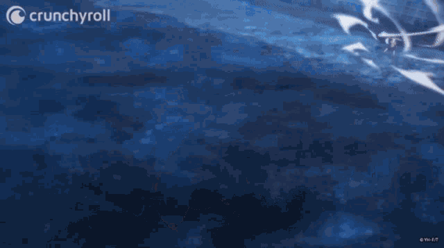 a blurry picture of a person flying through the air with a blue sky in the background .