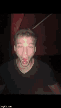 a blurry picture of a man 's face with the website imgflip.com in the lower right corner