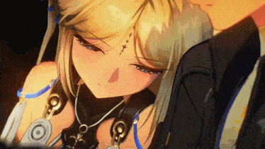 a girl with blonde hair and blue eyes is looking down