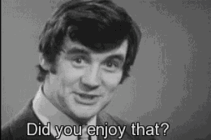 a black and white photo of a man in a suit and tie with the words `` did you enjoy that ? ''