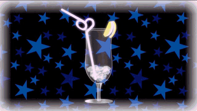 a glass with a straw and a lemon slice