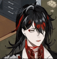 a girl with long black hair and red highlights is wearing a red scarf around her neck .