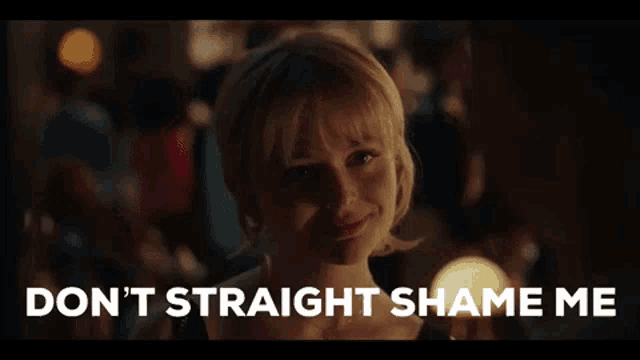 a woman says " don 't straight shame me " while looking at a man