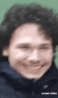 a blurry picture of a man 's face with the website lunaai.video written below it