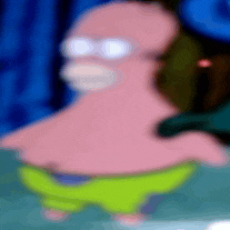 a blurred image of patrick star from spongebob squarepants wearing glasses .