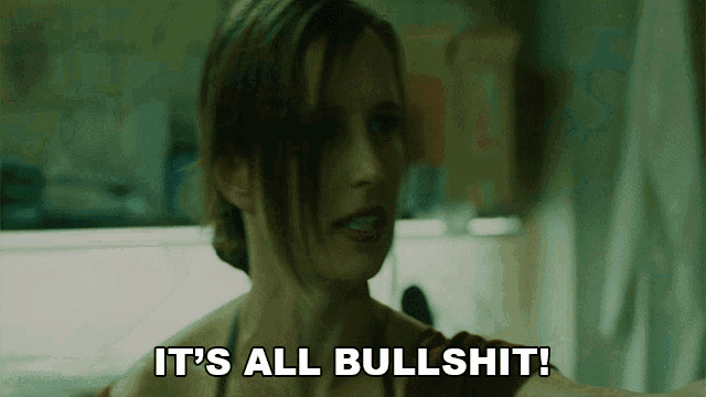 a woman says " it 's all bullshit " in front of her