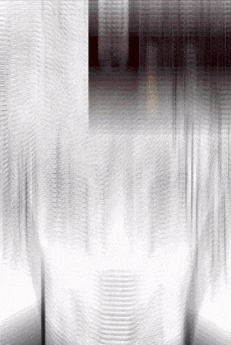 a blurred image of a white background with a few lines